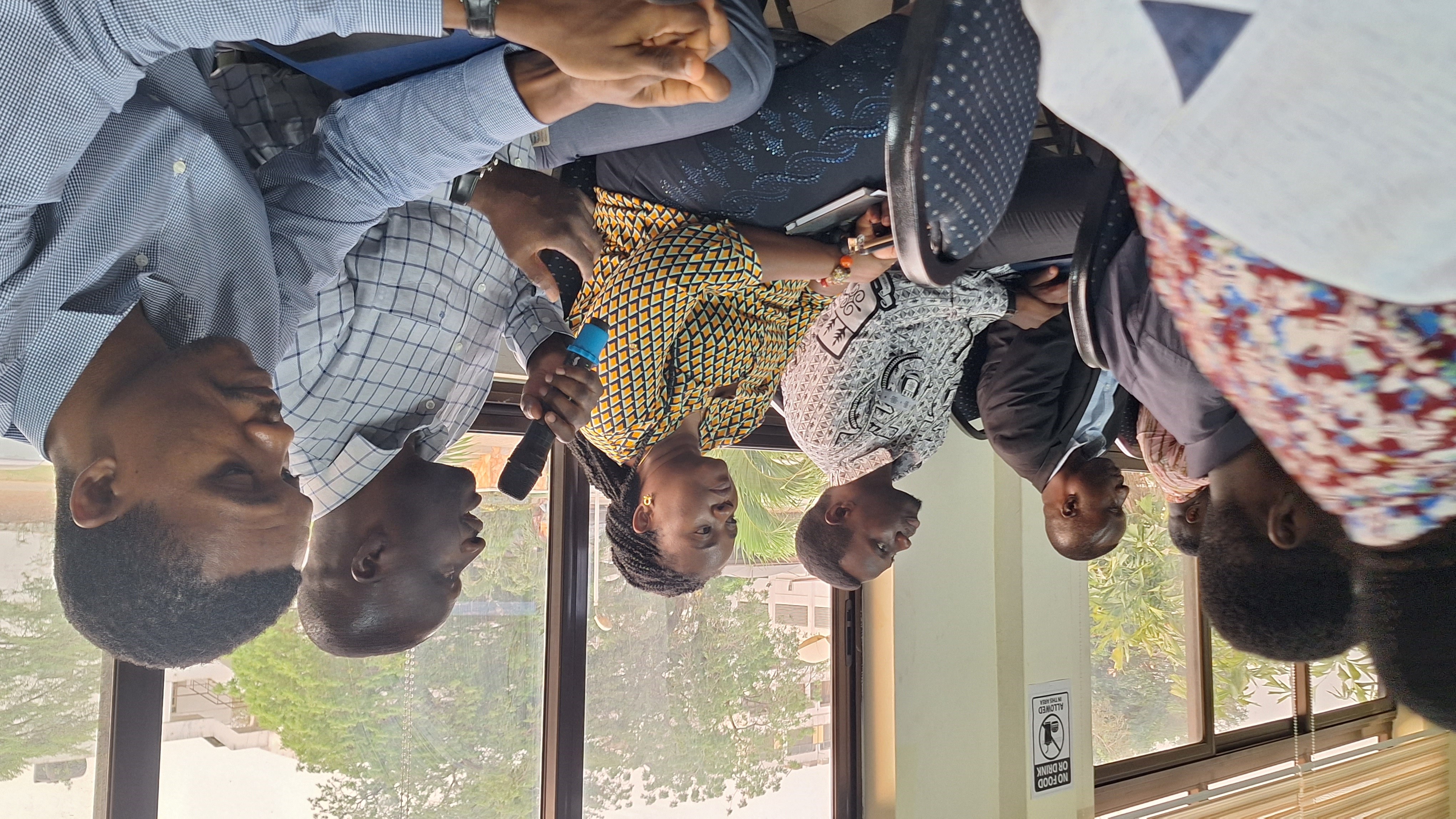 Prof. Quartey presents ReFinD tokens to Mr. Asante, expressing gratitude for the insightful interactions. Joining them are Ms. Otoo, ReFinD Project Director, and a member of the ReFinD team